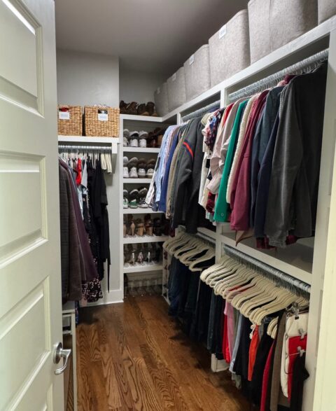 Walk-in closet after organizing